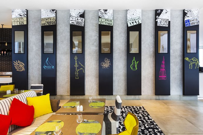 Imagen del bar/restaurante del Hotel ibis Styles Dubai Airport. Foto 10