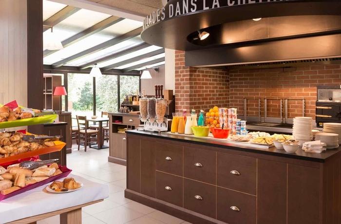 Imagen del bar/restaurante del Hotel ibis Styles Parc des Expositions de Villepinte. Foto 9