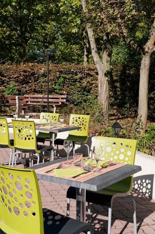 Imagen del bar/restaurante del Hotel ibis Styles Parc des Expositions de Villepinte. Foto 11