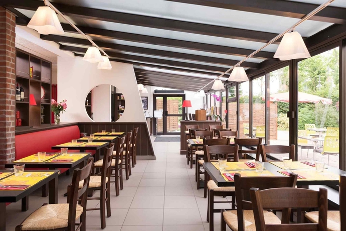 Imagen del bar/restaurante del Hotel ibis Styles Parc des Expositions de Villepinte. Foto 13