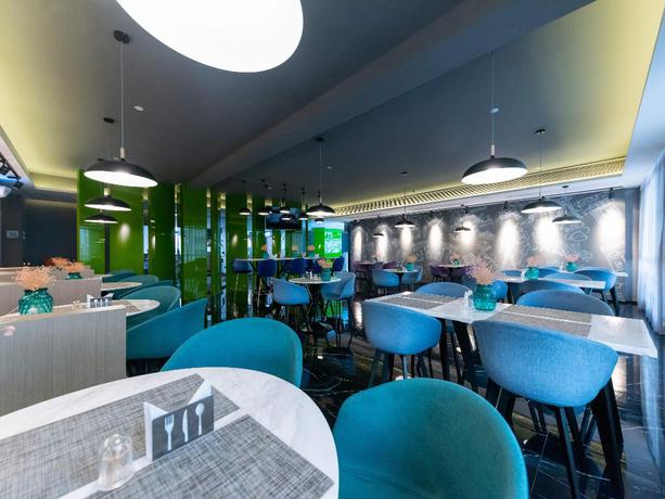Imagen del bar/restaurante del Hotel ibis Styles Quanzhou Quanxiu Road. Foto 2