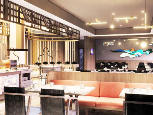 Imagen del bar/restaurante del Hotel ibis Styles Semarang Simpang Lima. Foto 3