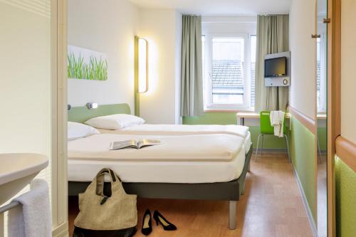 Imagen de la habitación del Hotel ibis budget Aachen City. Foto 5