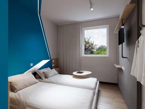 Imagen de la habitación del Hotel ibis budget Arlon Porte du Luxembourg. Foto 3