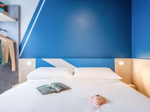 Imagen de la habitación del Hotel ibis budget Arlon Porte du Luxembourg. Foto 4