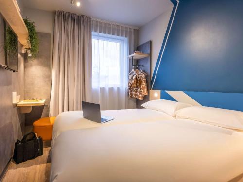 Imagen de la habitación del Hotel ibis budget Arlon Porte du Luxembourg. Foto 6