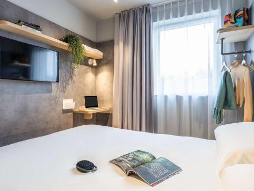 Imagen de la habitación del Hotel ibis budget Arlon Porte du Luxembourg. Foto 7