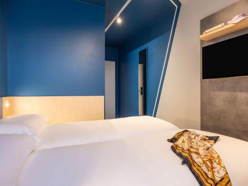 Imagen de la habitación del Hotel ibis budget Arlon Porte du Luxembourg. Foto 9