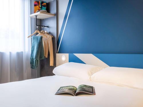 Imagen de la habitación del Hotel ibis budget Arlon Porte du Luxembourg. Foto 10
