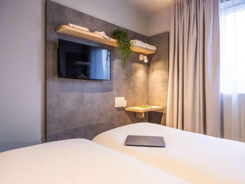 Imagen de la habitación del Hotel ibis budget Arlon Porte du Luxembourg. Foto 11