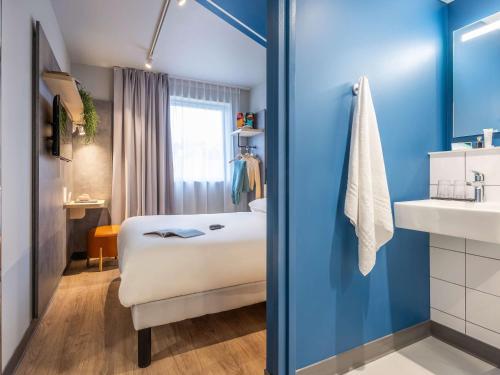 Imagen de la habitación del Hotel ibis budget Arlon Porte du Luxembourg. Foto 14
