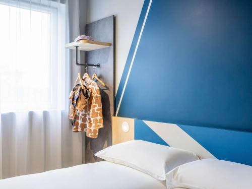 Imagen de la habitación del Hotel ibis budget Arlon Porte du Luxembourg. Foto 15