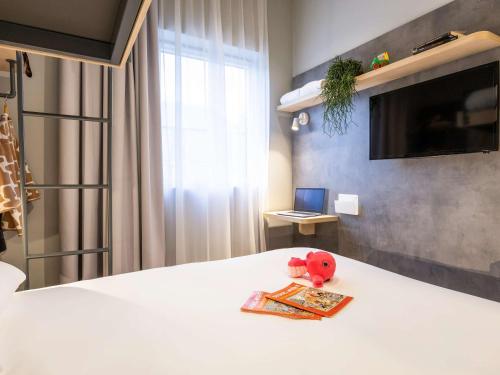 Imagen de la habitación del Hotel ibis budget Arlon Porte du Luxembourg. Foto 17