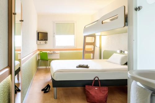 Imagen de la habitación del Hotel ibis budget Augsburg City. Foto 6