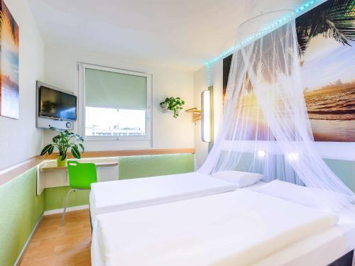 Imagen de la habitación del Hotel ibis budget Berlin Kurfürstendamm. Foto 6