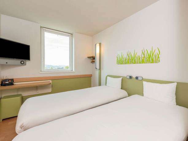 Imagen de la habitación del Hotel ibis budget Bern Expo. Foto 7