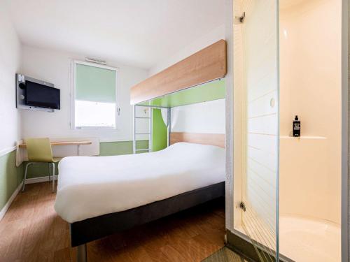 Imagen de la habitación del Hotel ibis budget Carcassonne Aeroport. Foto 6