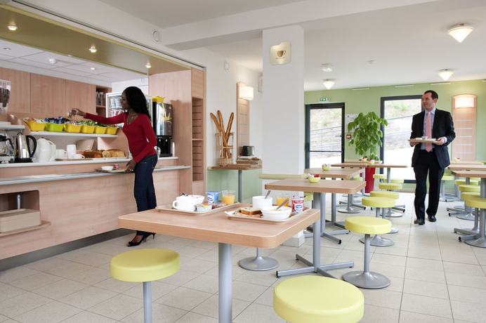 Imagen del bar/restaurante del Hotel ibis budget Chatillon Paris Ouest. Foto 2