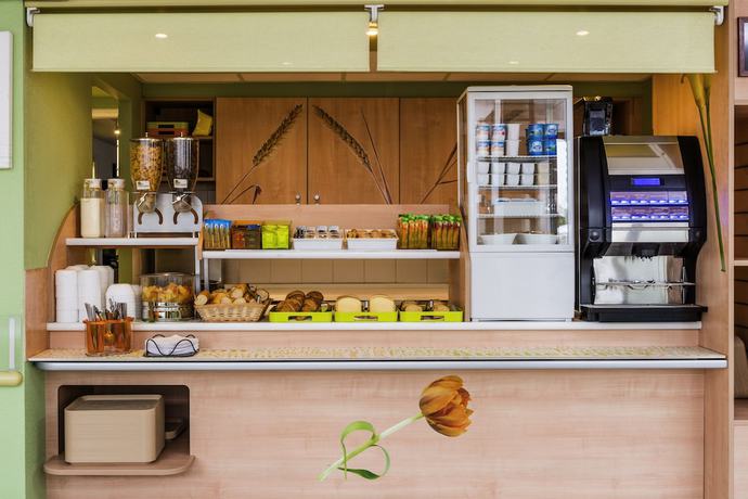 Imagen del bar/restaurante del Hotel ibis budget Chatillon Paris Ouest. Foto 4