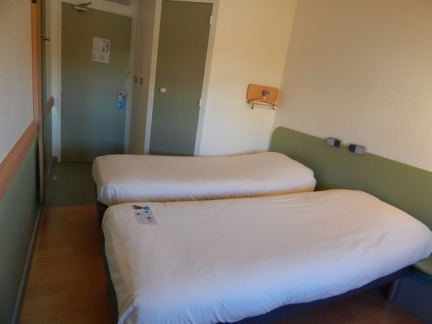 Imagen de la habitación del Hotel ibis budget Clermont Ferrand Sud Aubière. Foto 4