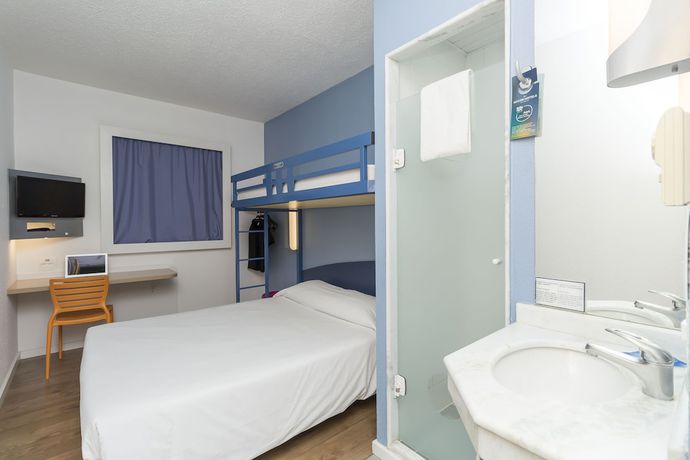 Imagen de la habitación del Hotel ibis budget Curitiba Centro. Foto 10