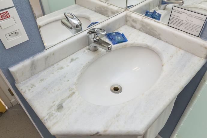 Imagen de la habitación del Hotel ibis budget Curitiba Centro. Foto 11