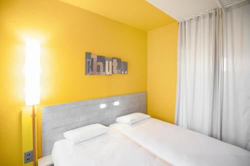 Imagen de la habitación del Hotel ibis budget Genève Aéroport. Foto 8