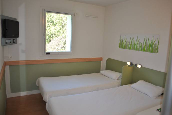 Imagen de la habitación del Hotel ibis budget Loriol le Pouzin. Foto 10