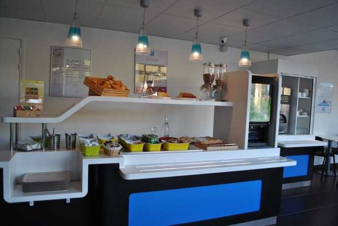 Imagen del bar/restaurante del Hotel ibis budget Loriol le Pouzin, ZA du Pouzin. Foto 4