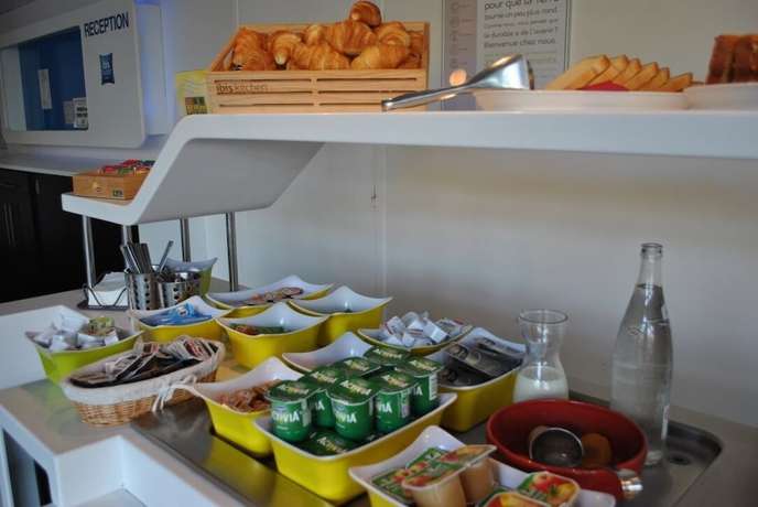 Imagen del bar/restaurante del Hotel ibis budget Loriol le Pouzin, ZA du Pouzin. Foto 5