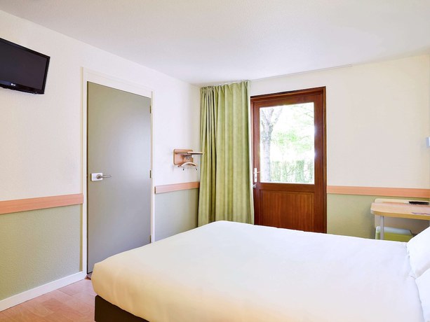 Imagen de la habitación del Hotel ibis budget Lyon Villefranche sur Saône. Foto 8