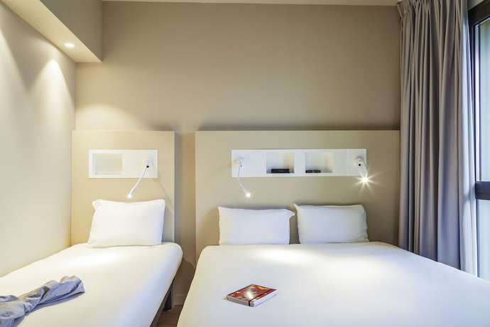 Imagen de la habitación del Hotel ibis budget Montpellier Aeroport Parc Des Expos. Foto 10