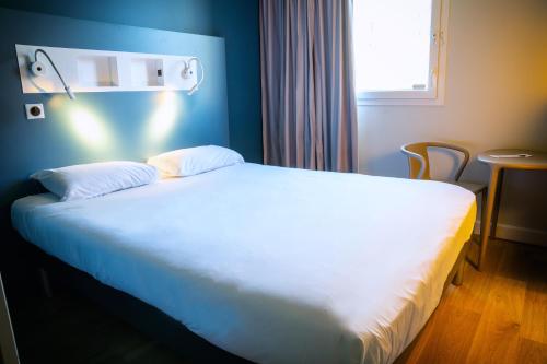 Imagen de la habitación del Hotel ibis budget Reims Parc Des Expositions, Reims. Foto 17