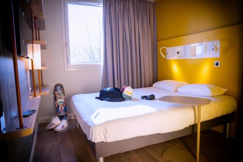 Imagen de la habitación del Hotel ibis budget Reims Parc Des Expositions, Reims. Foto 20