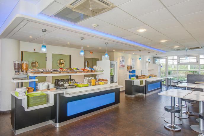 Imagen del bar/restaurante del Hotel ibis budget Roissy CDG Paris Nord 2. Foto 3