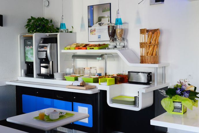 Imagen del bar/restaurante del Hotel ibis budget Rouen Sud Zenith. Foto 7