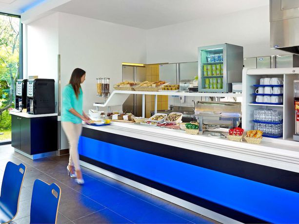 Imagen del bar/restaurante del Hotel ibis budget Warszawa Reduta. Foto 6