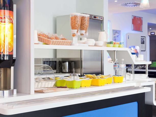 Imagen del bar/restaurante del Hotel ibis budget Warszawa Reduta. Foto 7