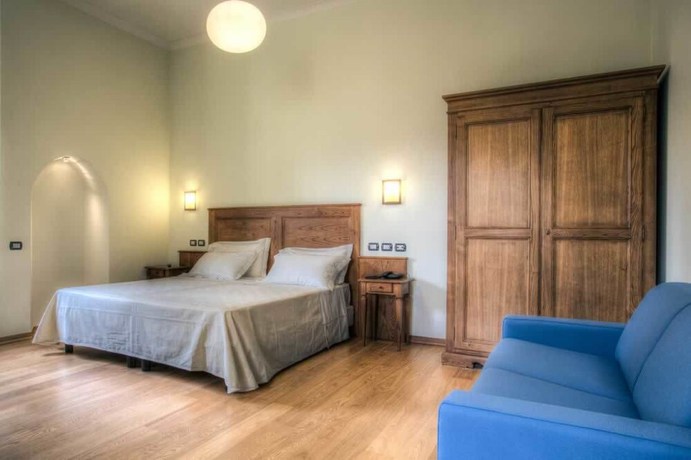 Imagen de la habitación del Hotel il Duca del Montefeltro. Foto 4