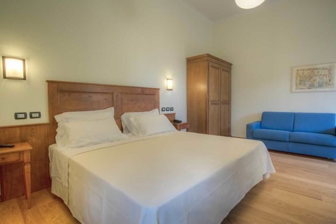 Imagen de la habitación del Hotel il Duca del Montefeltro. Foto 5