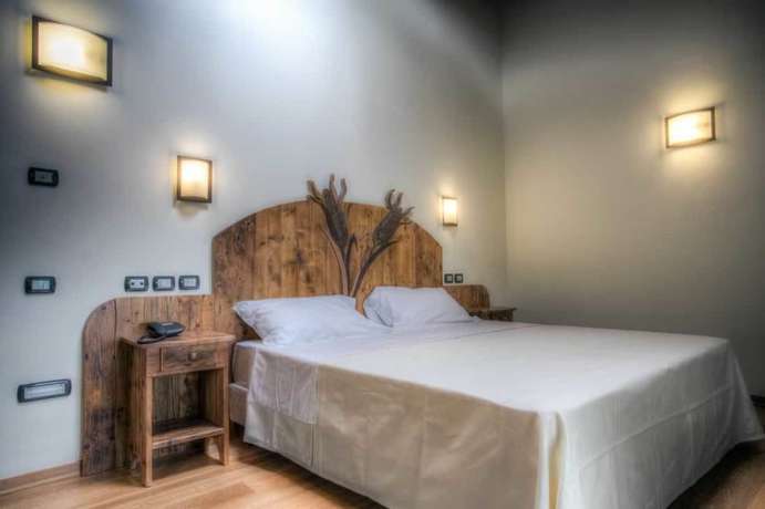 Imagen de la habitación del Hotel il Duca del Montefeltro. Foto 12