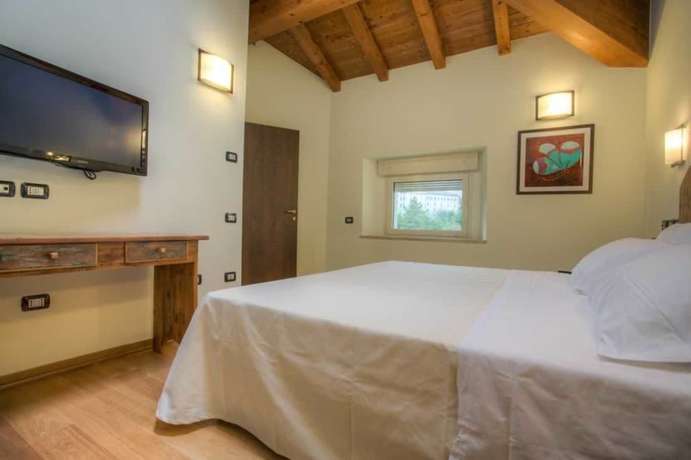 Imagen de la habitación del Hotel il Duca del Montefeltro. Foto 16