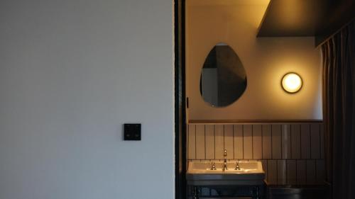Imagen de la habitación del Hotel 彼厅酒店in between. Foto 14