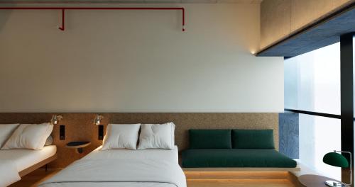 Imagen de la habitación del Hotel 彼厅酒店in between. Foto 18