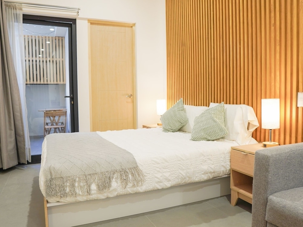 Imagen de la habitación del Hotel indiana suites. Foto 1