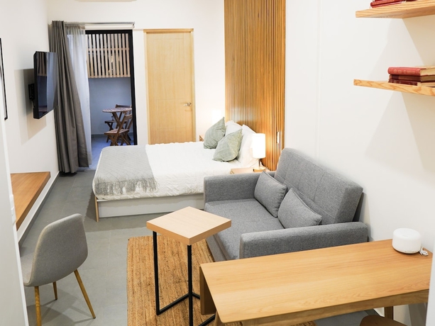 Imagen de la habitación del Hotel indiana suites. Foto 2