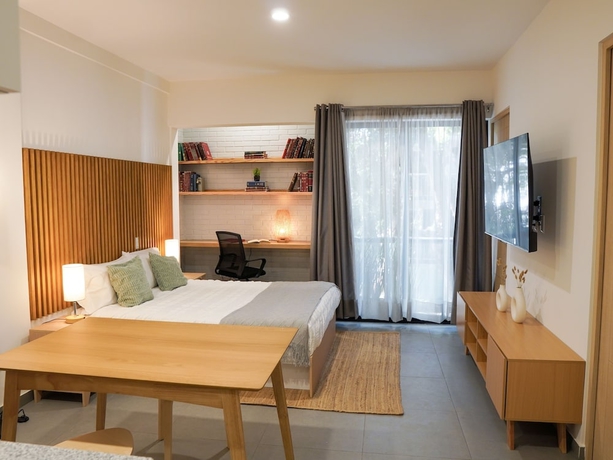 Imagen de la habitación del Hotel indiana suites. Foto 11