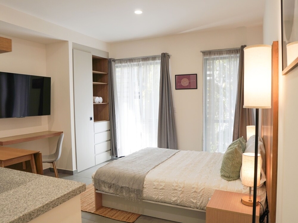 Imagen de la habitación del Hotel indiana suites. Foto 13