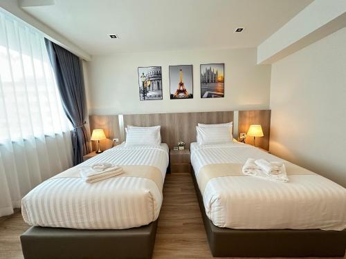 Imagen de la habitación del Hotel indigo Hatyai. Foto 12