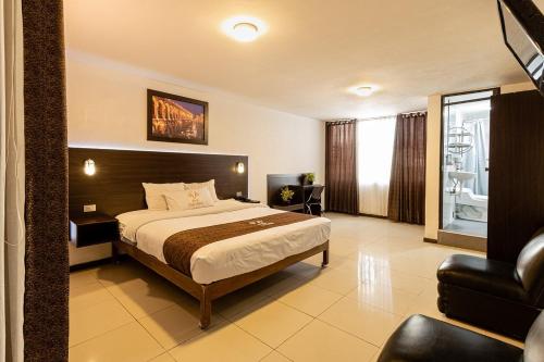 Imagen de la habitación del Hotel inka luxe casa rams. Foto 10
